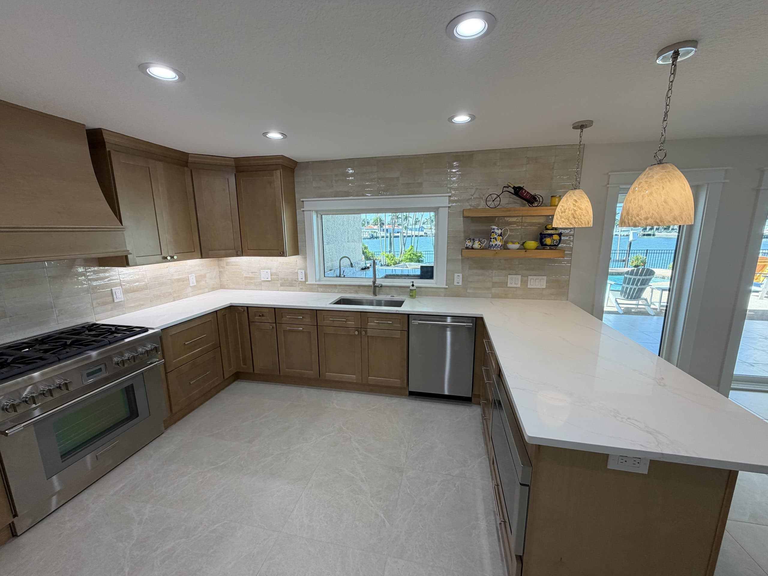 Custom kitchen with quartz waterfall island — Tampa Bay